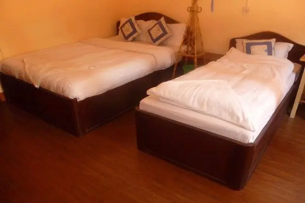 Tek Büyük veya İki Ayrı Yataklı Oda, Bahçe Manzaralı