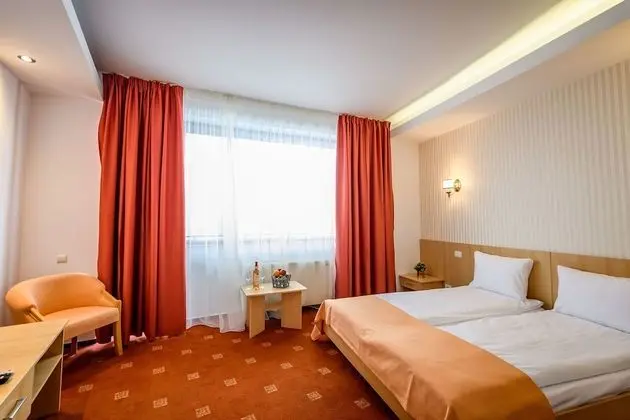 Basic Tek Büyük veya İki Ayrı Yataklı Oda