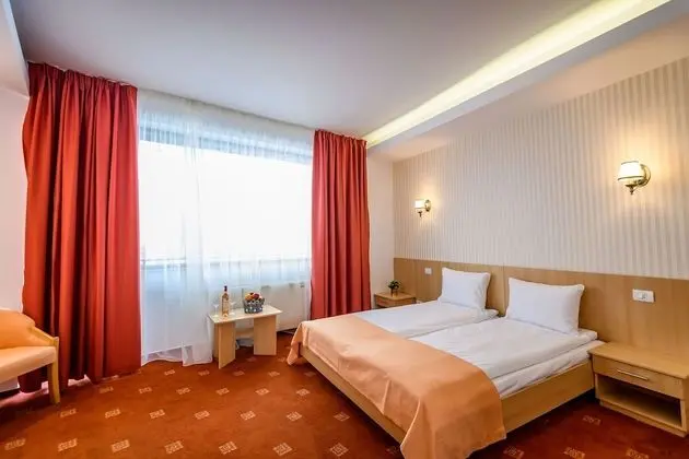 Basic Tek Büyük veya İki Ayrı Yataklı Oda