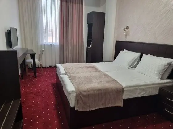 Business Tek Büyük veya İki Ayrı Yataklı Oda