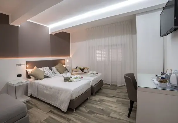 Deluxe Tek Büyük veya İki Ayrı Yataklı Oda