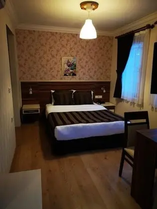 Üç Kişilik Oda