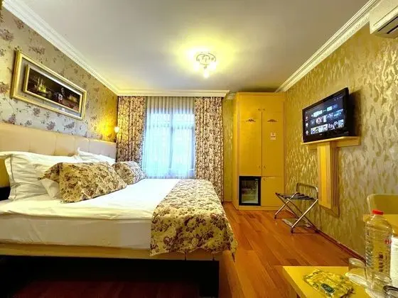 Economy Tek Büyük veya İki Ayrı Yataklı Oda