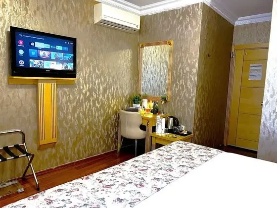 Economy Tek Büyük veya İki Ayrı Yataklı Oda