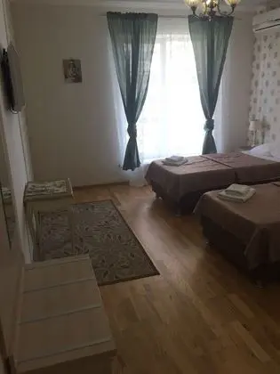 Deluxe Tek Büyük veya İki Ayrı Yataklı Oda