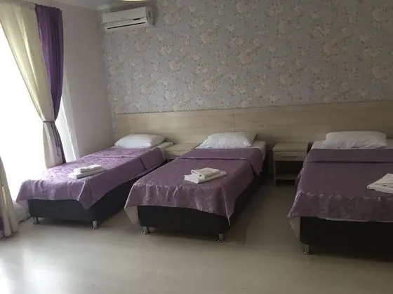 Deluxe Üç Kişilik Oda