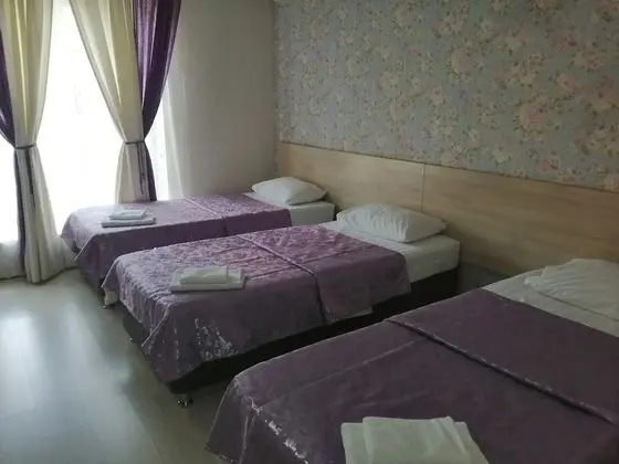Deluxe Üç Kişilik Oda