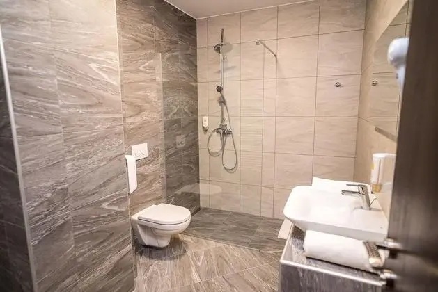 Deluxe Tek Büyük veya İki Ayrı Yataklı Oda
