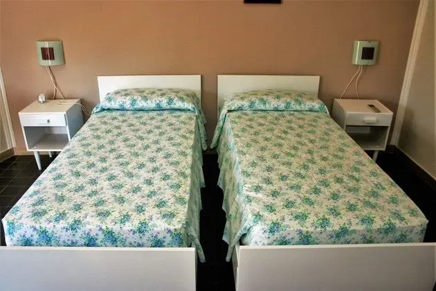 Tek Büyük veya İki Ayrı Yataklı Oda, Bahçe Manzaralı