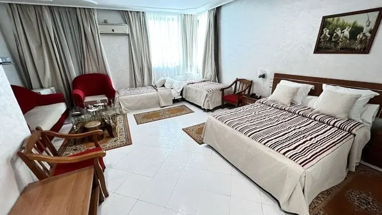 Üç Kişilik Oda