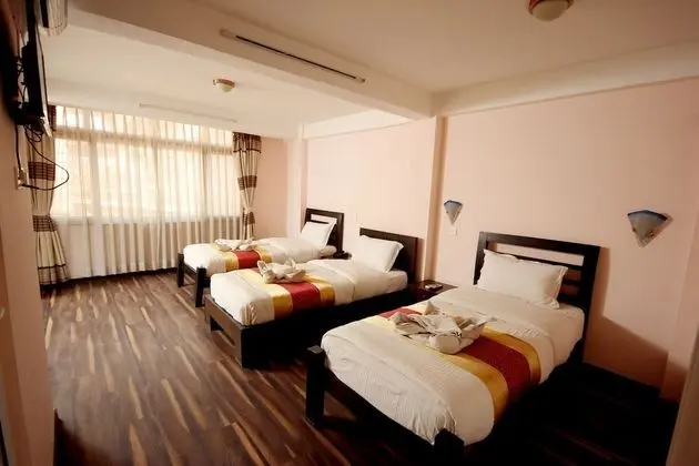 Deluxe Tek Büyük veya İki Ayrı Yataklı Oda