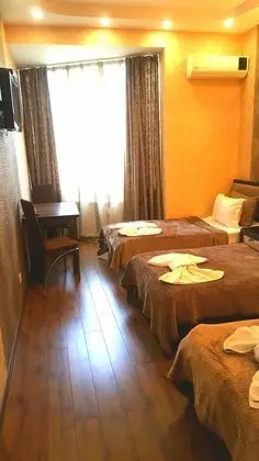 Üç Kişilik Oda
