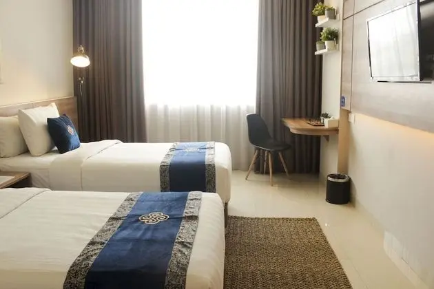 Deluxe Tek Büyük veya İki Ayrı Yataklı Oda