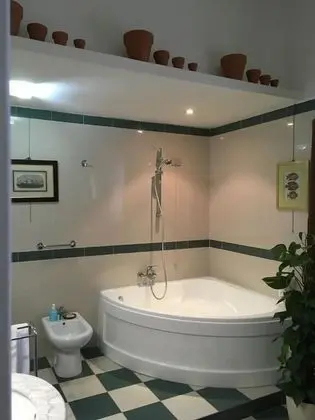 Deluxe Tek Büyük veya İki Ayrı Yataklı Oda (La Stanza della Nonna)