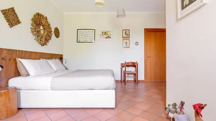 Tek Büyük veya İki Ayrı Yataklı Oda (Tiglio)