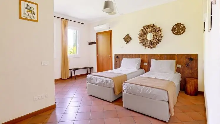 Tek Büyük veya İki Ayrı Yataklı Oda (Tiglio)