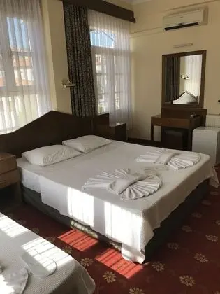 Üç Kişilik Oda