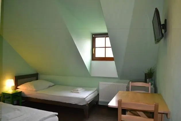 Economy Tek Büyük veya İki Ayrı Yataklı Oda (Attic)