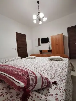 Üç Kişilik Oda
