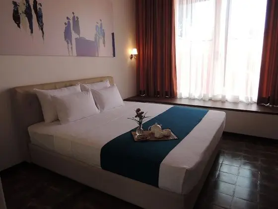 Deluxe Tek Büyük veya İki Ayrı Yataklı Oda