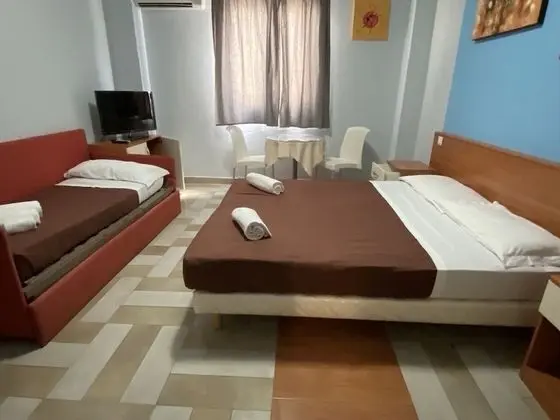 Üç Kişilik Oda