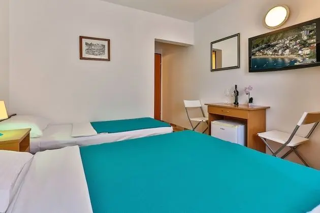 Economy Üç Kişilik Oda