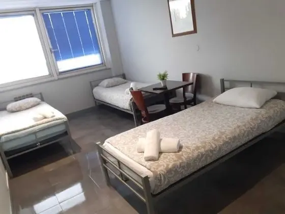 Basic Üç Kişilik Oda, Ortak Banyo