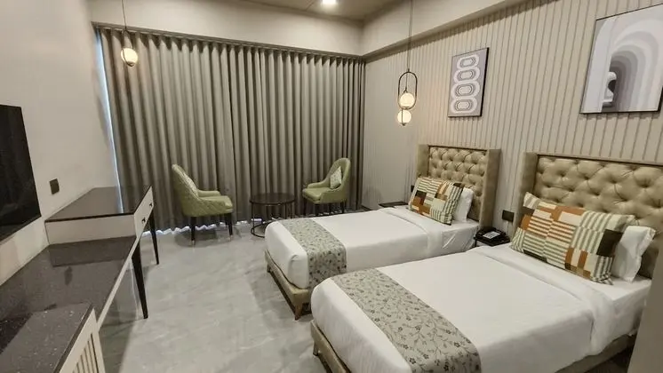 Deluxe Tek Büyük veya İki Ayrı Yataklı Oda