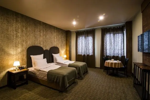Deluxe Tek Büyük veya İki Ayrı Yataklı Oda