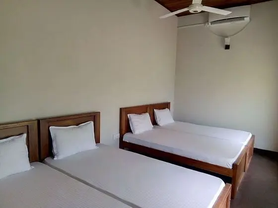 Deluxe Dört Kişilik Oda, Bahçe Manzaralı