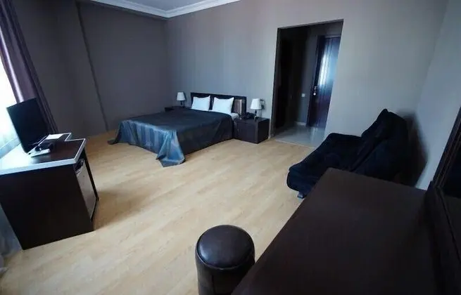 Deluxe Üç Kişilik Oda