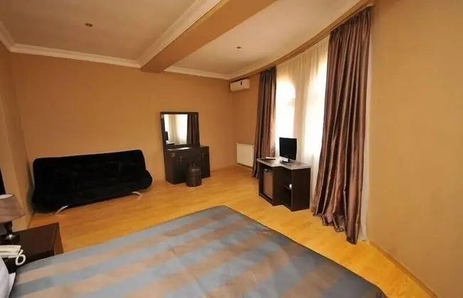 Deluxe Üç Kişilik Oda