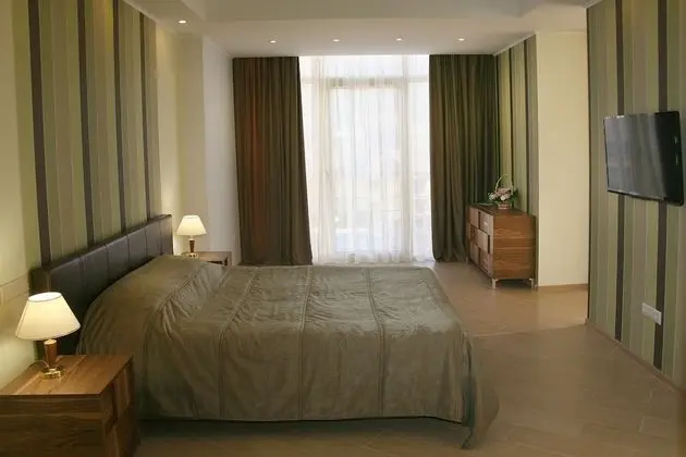 Deluxe Tek Büyük veya İki Ayrı Yataklı Oda