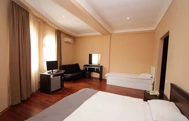 Deluxe Üç Kişilik Oda