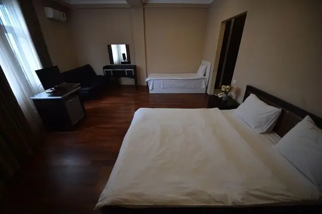 Deluxe Üç Kişilik Oda