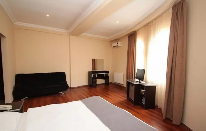 Deluxe Üç Kişilik Oda