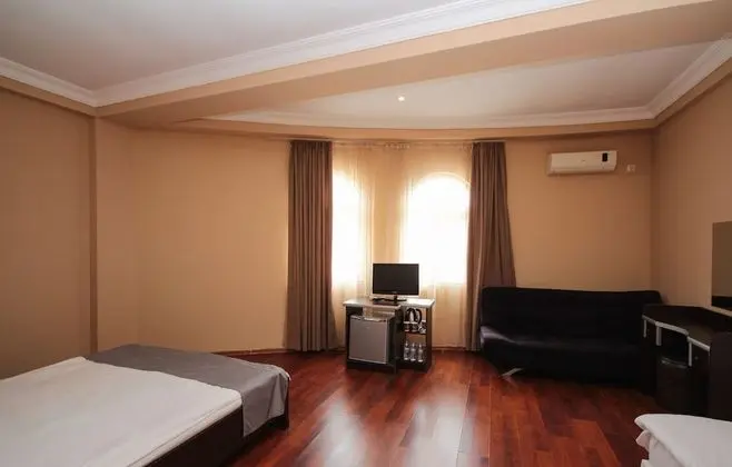 Deluxe Üç Kişilik Oda