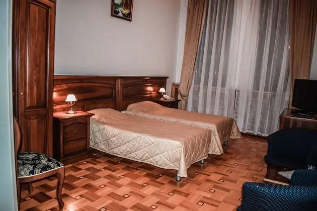 Deluxe Tek Büyük veya İki Ayrı Yataklı Oda