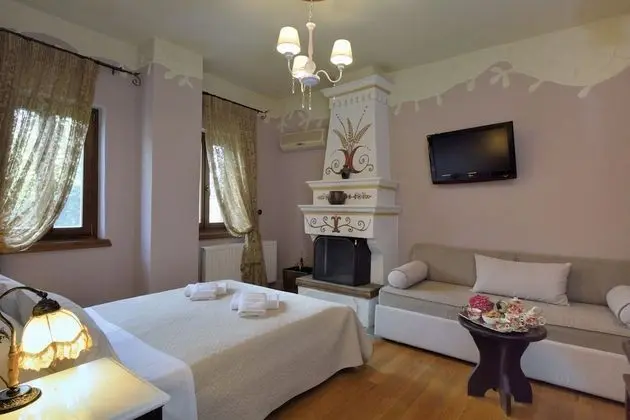 Deluxe Tek Büyük veya İki Ayrı Yataklı Oda, Şömine