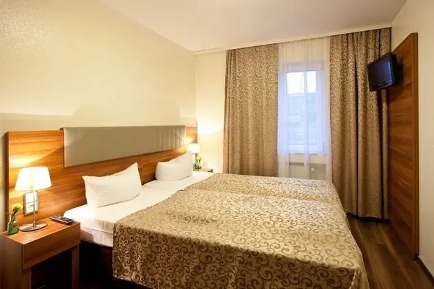 Comfort Tek Büyük veya İki Ayrı Yataklı Oda