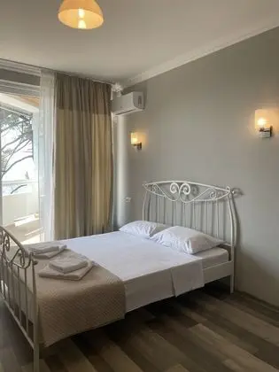 Standard Tek Büyük veya İki Ayrı Yataklı Oda, Kısmi Deniz Manzaralı