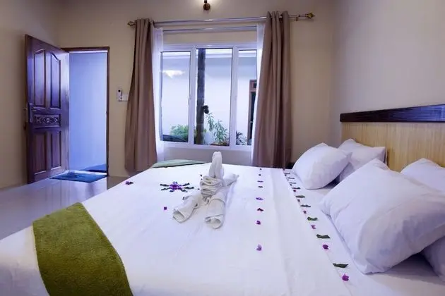Deluxe Tek Büyük veya İki Ayrı Yataklı Oda, Balkon, Bahçe Manzaralı