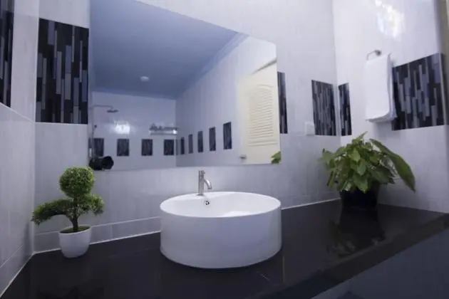Deluxe Tek Büyük veya İki Ayrı Yataklı Oda, Balkon, Bahçe Manzaralı