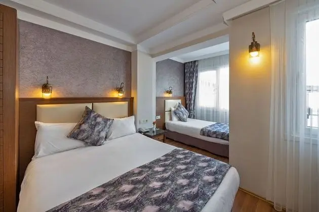 Üç Kişilik Oda