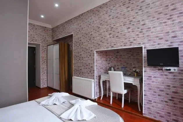 Deluxe Üç Kişilik Oda, Şehir Manzaralı