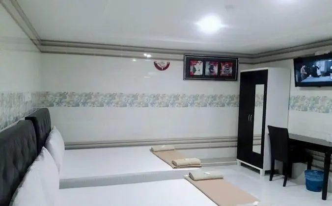 Üç Kişilik Oda