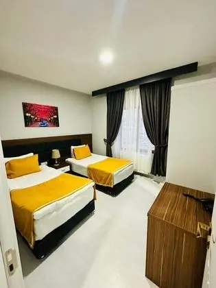 Basic Tek Büyük veya İki Ayrı Yataklı Oda