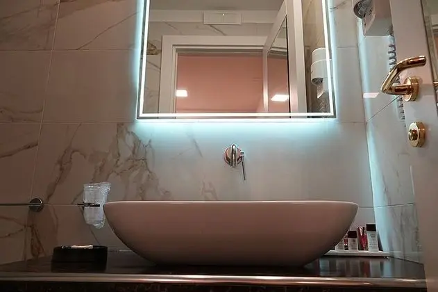 Deluxe Tek Büyük veya İki Ayrı Yataklı Oda