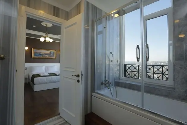 Deluxe Dört Kişilik Oda, Deniz Manzaralı