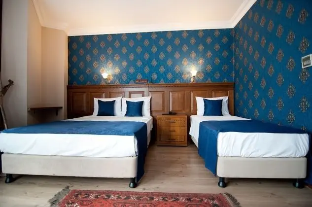 Deluxe Üç Kişilik Oda
